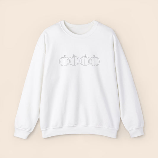 4 pumpkins on a crewneck sweatshirt